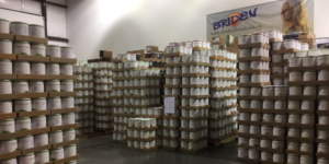 Stacks of #10 sized food cans at the Briden Solutions warehouse in Calgary Alberta Canada.