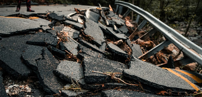 road falling apart after a natural disaster