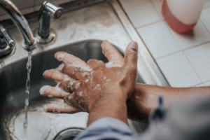 using soap to wash your hands for sanitation